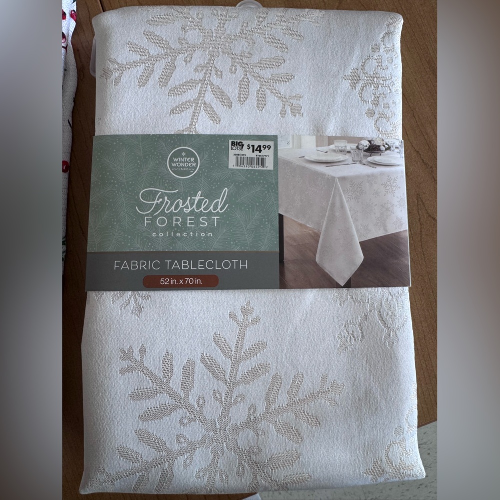 Frosted Forest Fabric Tablecloth and a Festive Cardinal seasonal Tablecloth